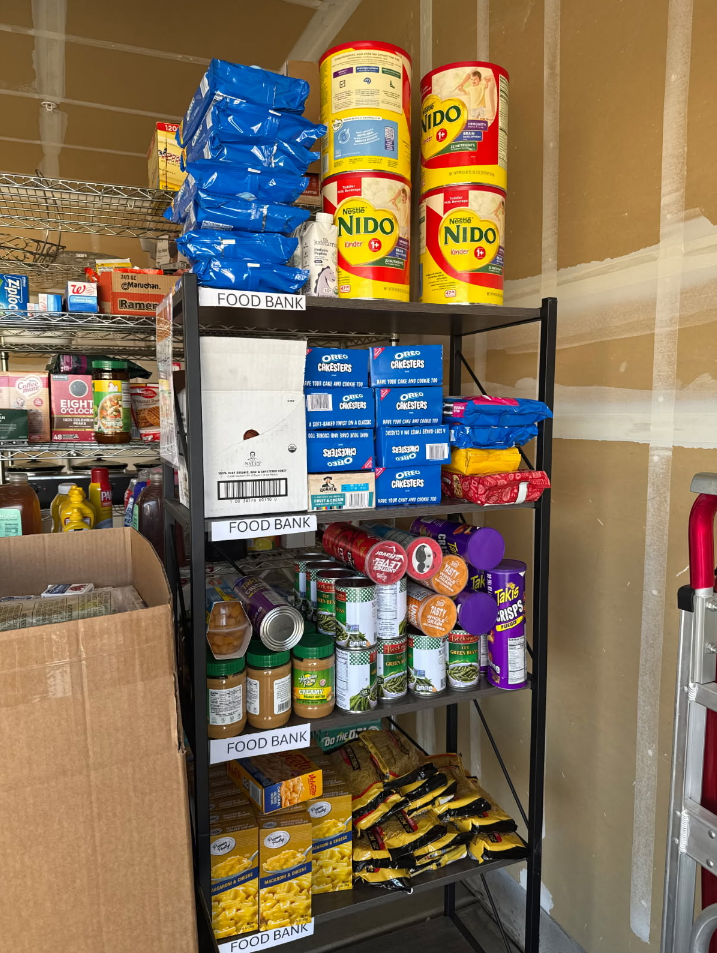 Shelves of shelf-stable food organized for community distribution